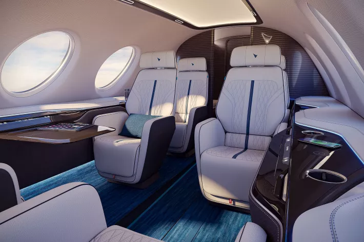 Салон электросамолета в VIP-версии с клубной рассадкой - фото