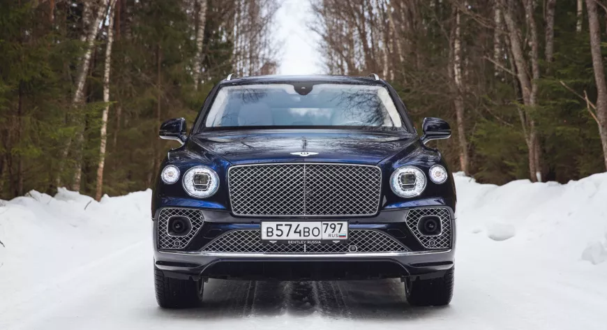 Bentley Bentayga на Заснеженной лесной дороге: нам нет преград - фото